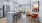 pendant lights over kitchen island next to dining table